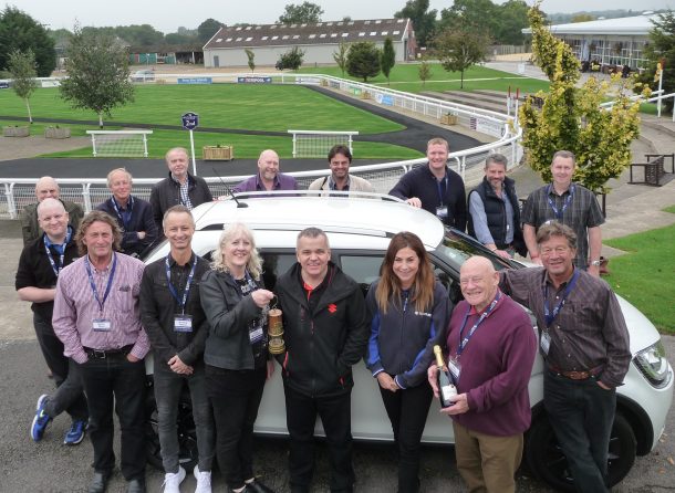 Suzuki Ignis wins Northern Group's Car of the Year Award - Julie Marshall, chair of the Northern Group, presents the miner’s lamp to Alun Parry. Also pictured are members of the Northern Group.