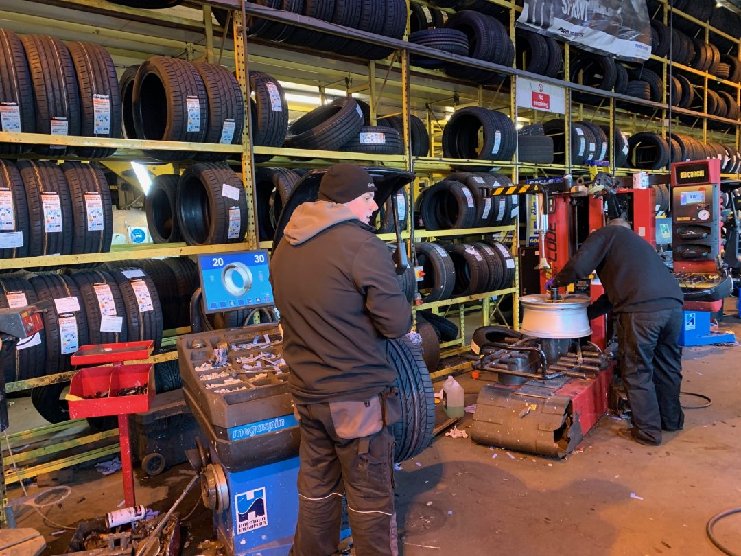 A new set of Bridgestone Potenza run flats being fitted to the M Sport rims.